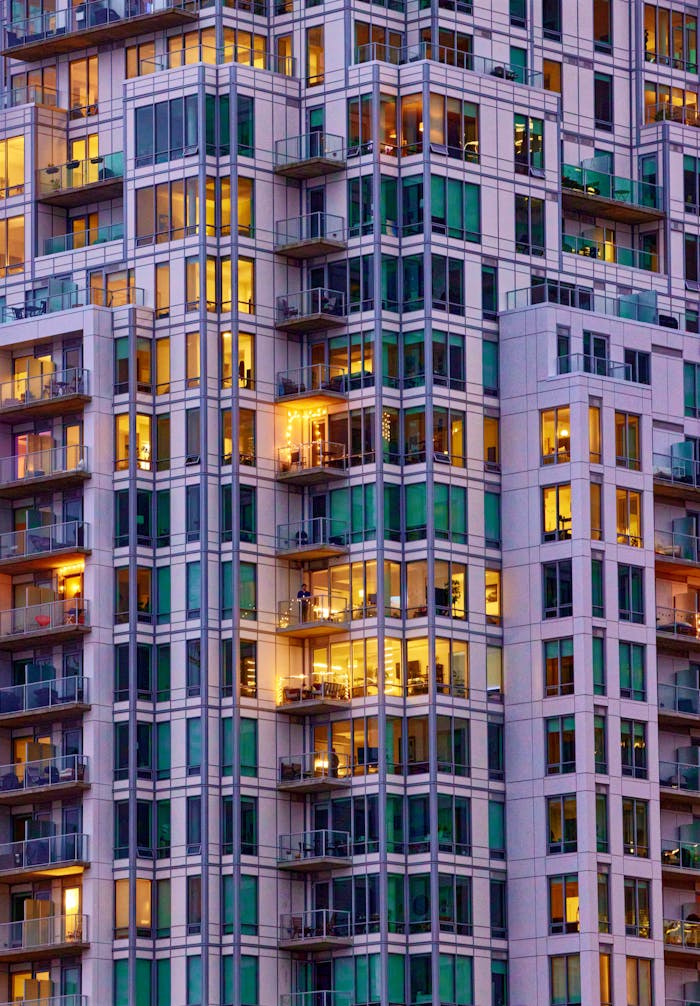 View of Skyscraper with Illuminated Apartments